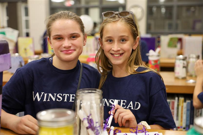 Two girls smile